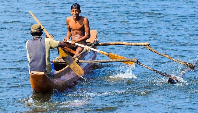 Fischer in ihrem Boot