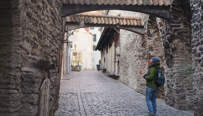 Travelling admiring architecture of old town Tallinn, Estonia