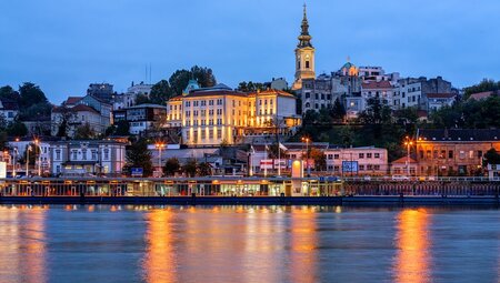 Belgrade riverside with twinkling lights in the evening