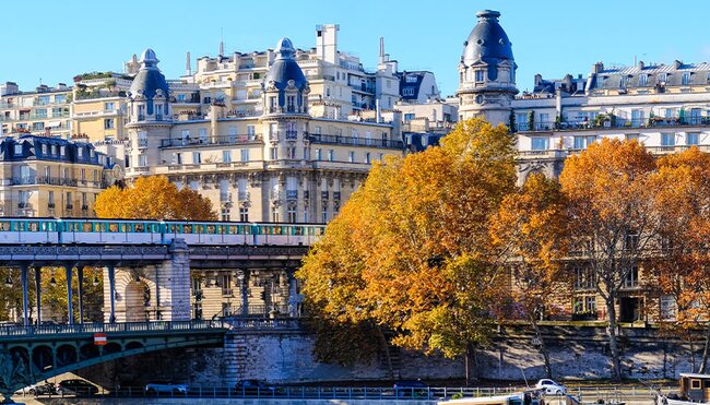 Local train over the River Siena, Paris, France