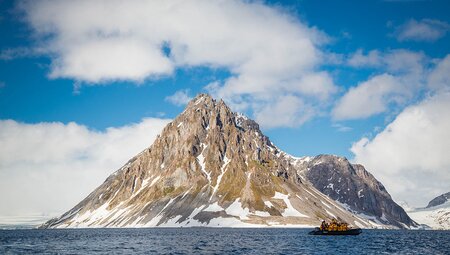 Zodiac cruising off the coast of Spitsbergen