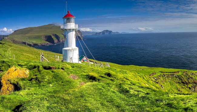 Panoramic view of Old lighthouse on the beautiful island Mykines, Faroe islands