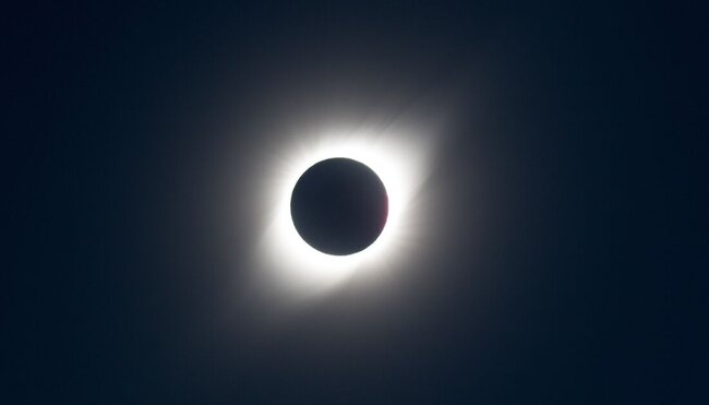 Total solar eclipse over the sky of Greenland's Arctic Circle