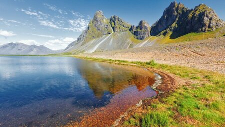The crystal clear waters and mountains of Djupivogur, a little town located on an Icelandic penninsula