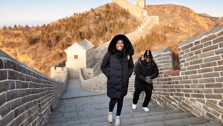 Travellers hiking the Great Wall of China in winter near Beijing