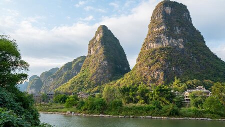Limestone towers beside the river in Yangshuo, China