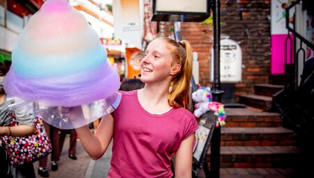Stopping for cotton candy on a tour of Harajuku in Tokyo