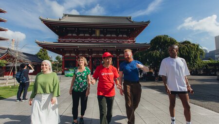 Group of Intrepid travellers and leader exploring Sensoji Temple in downtown Tokyo