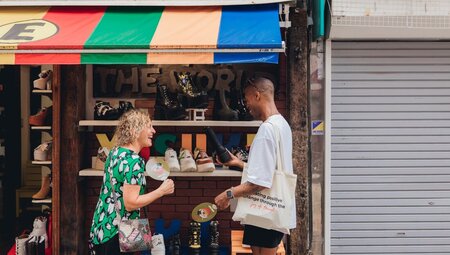 Intrepid travellers shopping while exploring the streets of Harajuku in Tokyo Japan