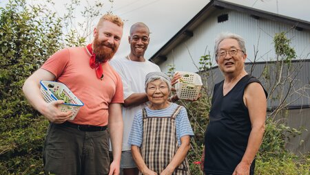 Intrepid travellers with their hosts during a homestay in Japan