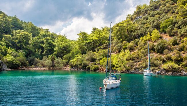 Sailing boat anchored in a bay in Gocek municipality islands in Turkish Riviera