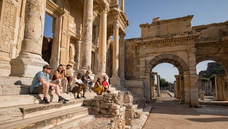 Group of travellers exploring Ephesus ancient city, Turkey