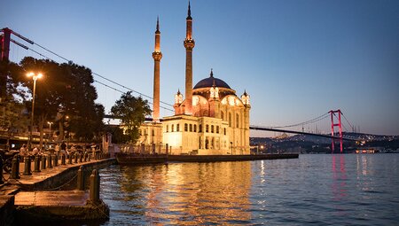 A mosque in Istanbul, Turkey, with the lights on before sunrise