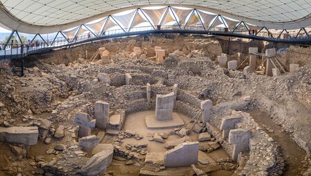 Neolithic settlement ruins site of Gobleki Tepe in eastern Turkey with megaliths protected by arching tent