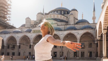 Traveller enjoying her time at the Blue Mosque in Istanbul, Turkey