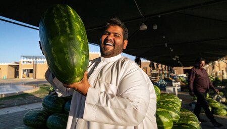 Simple joy of fresh watermelon in the markets of Hail, Saudi Arabia