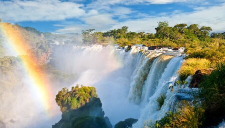 rainbow over iguazu falls