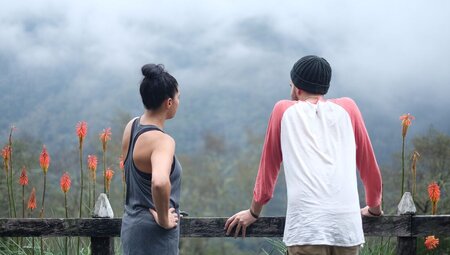 Travellers at a lookout over Cocora Cloud Forest in Cocora Valley Colombia