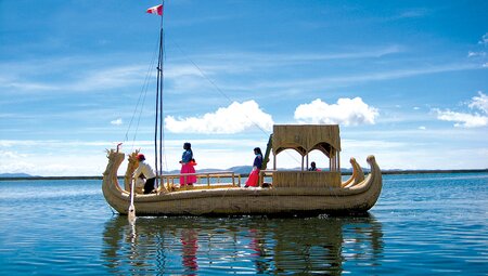Locals on reed boat, Lake Titicaca, Peru