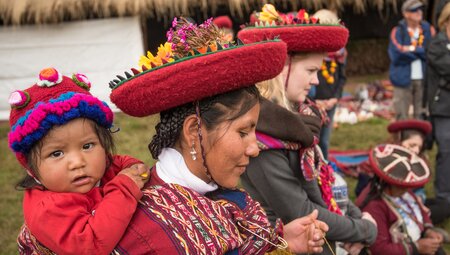 Local mother and child in traditional attire in Sacred Valley, Peru