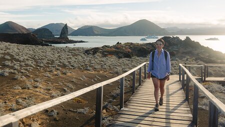 Traveller on boardwalk, Isla Bartolome, Galapagos Islands