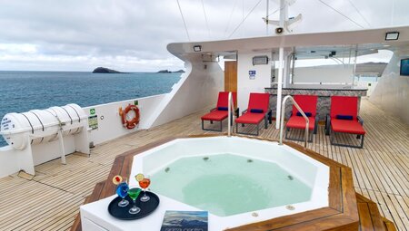 Spa and sun lounge on the upper deck of the Grand Queen Beatriz in the Galapagos