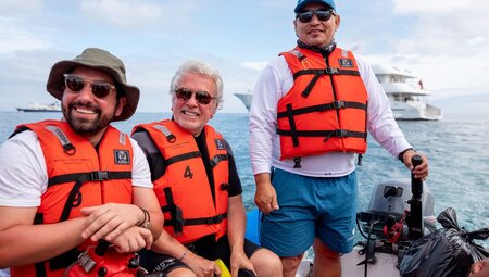 Travellers enjoy a zodiac cruise in the Galapagos isalnds
