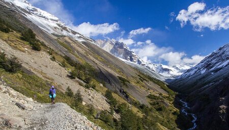 Hiker admiring the Ascencio Valley, Torres del Paine NP, Chile
