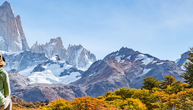 Traveller enjoying the view of Fitz Roy in the distance, Patagonia, El Chalten, Argentina