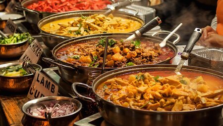 HHPG - Pots of traditional Indian curries on display