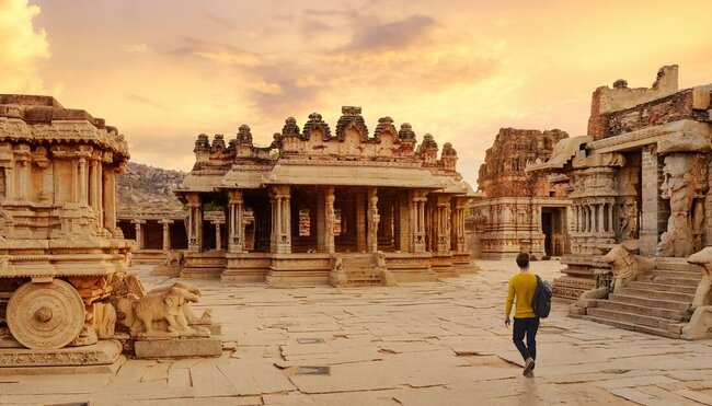 Exploring Vittala temple, one of the ancient temples around Hampi in southern India