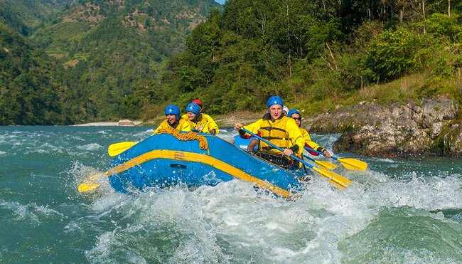 Travellers white water rafting on Tripoli River, Nepal