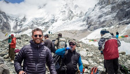 Intrepid Travellers stopping for a rest on their ascent to the Everest Base Camp in Nepal.