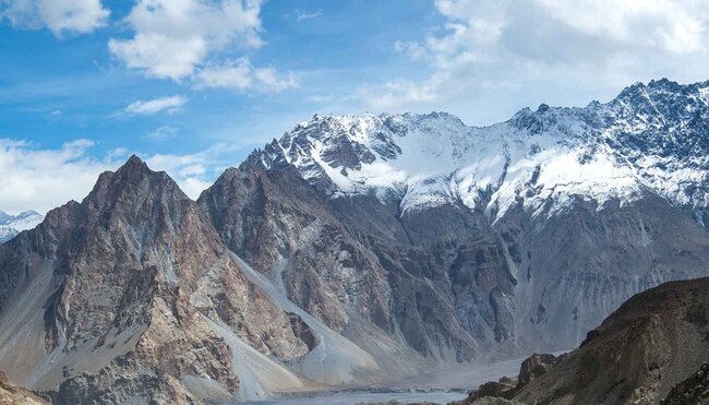 Rocky snow capped mountain range in the Hunza Valley