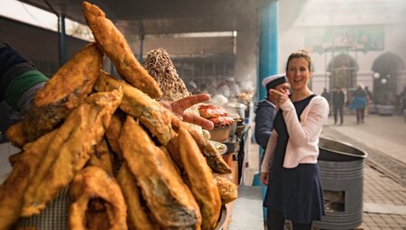 Intrepid traveller finding delectible treats at Chorsu Bazaar