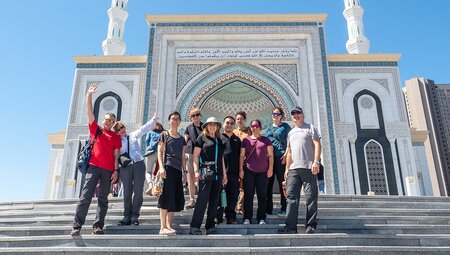 Intrepid Travellers stand outside the Hazrat Sultan Mosque in Astana