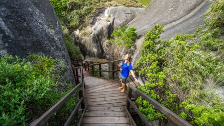Intrepid traveller enjoys the sunlight on a hiking break from Albany