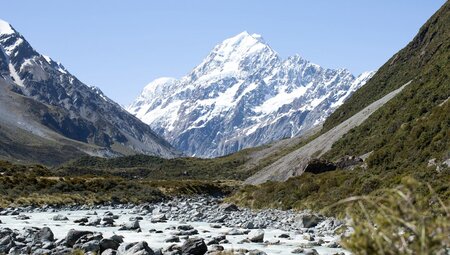 Mount Cook towers at the end of an alpine valley in the heart of New Zealand