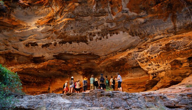 Travellers marvel at the rock texture of Cathedral Gorge in the Bungle Bungles Western Australia