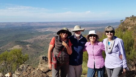 Group of travellers in front of Tanderra Saddle, Flinders Ranges, South Australia