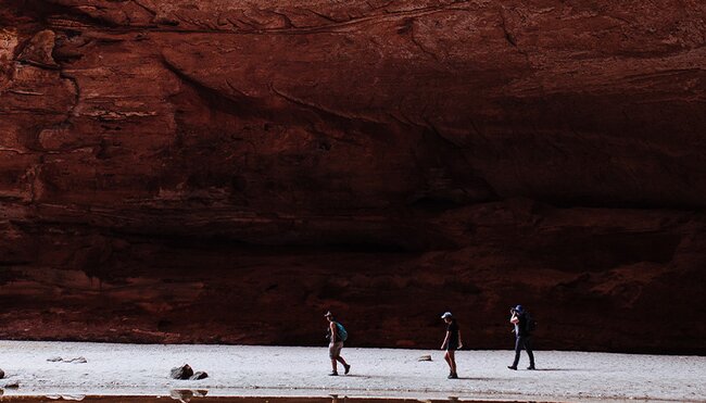 Travellers through Cathedral gorge in Purnululu NP, Western Australia