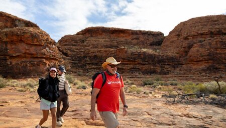 Guide leading a hike in Kings Canyon, NT, Australia