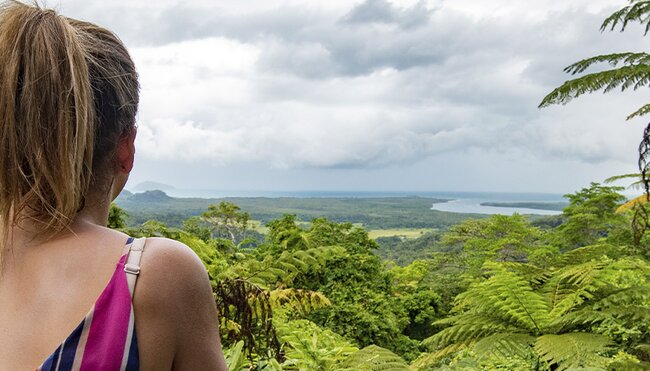 Traveller overlooking Cape Tribulation in Queensland, Australia