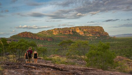 Travellers hiking through Kakadu NP towards Nadab lookout, Australia