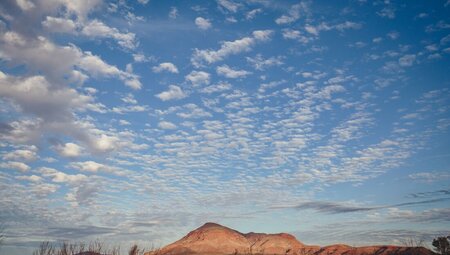 Mount Bruce gently rises against a placid sky in Karijini National Park