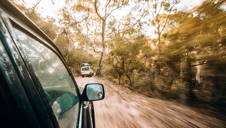 Driving a 4x4 through the bush on K'gari, Australia