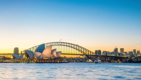 Sydney Opera House with the Harbour Bridge at twilight
