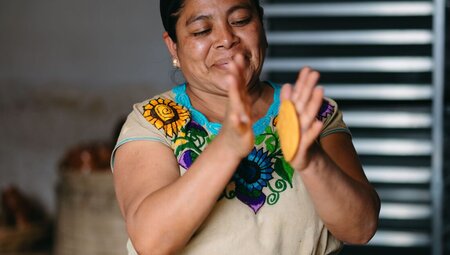 Local teacher of a tortilla making class in Antigua with El Comalote in Guatemala