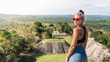 Traveller and ruins in San Ignacio, Belize