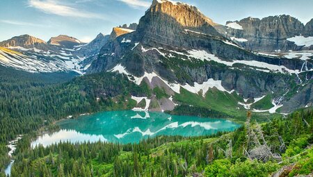 Looking out over Grinnell Lake valley in the mountains of Glacier National Park in Montana